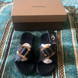 OluKai Black Sandals with Tan Buckle